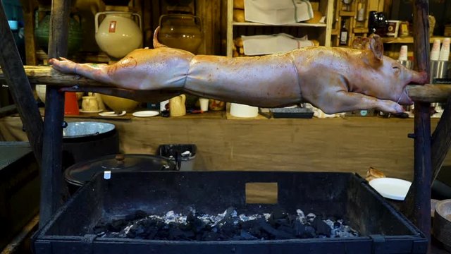 Closeup video of a roasted pig on market. Traditional cuisine. Budapest, Hungary.