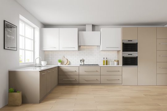 White and beige kitchen, counters and picture