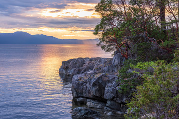 View of ocean sunset over mountains in beautiful British Columbia.