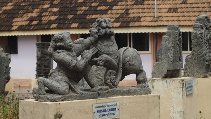statue of lion and Hoysala 