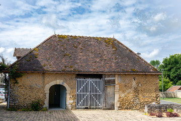 Fototapeta na wymiar Sceaux-sur-Huisne, France - Typical french village near Le Mans - A small house