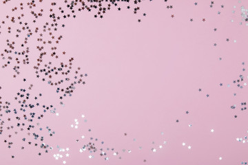 Festive backdrop with star shaped confetti