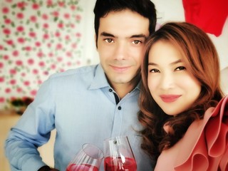 Copper lover drinking red wine to celebrate Christmas New Year holiday festival at home