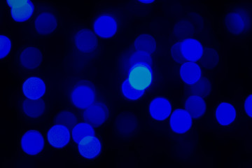 Abstract Blurry Background Bokeh. Blue glitter vintage lights. Defocused, soft focus.