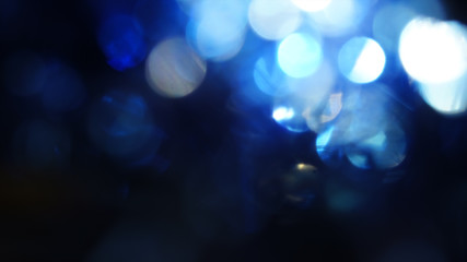 Tinsel bokeh, abstract background, shimmering tinsel with light effect