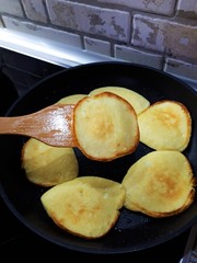  fresh, fried, tasty, fragrant pancakes in a pan