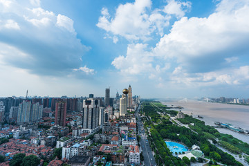 Wuhan skyline and Yangtze river with supertall skyscraper under construction in Wuhan Hubei China.