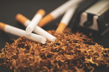 cigarette machine with tobacco and cigarettes