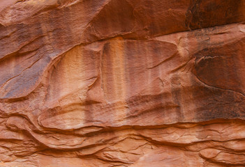 Textured stone surface with traces of erosion.