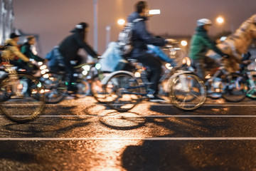 Silhouettes of group colorful cyclists on city road, illumination, abstract, motion blur, bike...