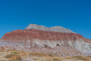 Landscape of striped or banded hills or badlands at the Teepess in Petrified Forest National Park in Arizona