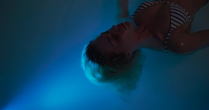 In this collection a young woman is enjoying a session in a salt water float tub.  One of the newest trends in spa health and wellness!  This collection was shot on a RED Gemini in 5K resolution with 