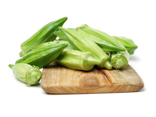 Fresh young okra isolated on white background