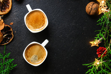 coffee, New Year, Christmas background or Noel holiday festive (nuts, specials, decorations and gifts on the table, greeting card) menu concept. food background. copy space. Top view