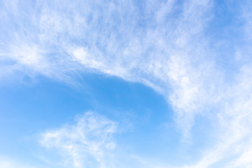 Naklejka na ściany i meble Beautiful blue clear sky with white clouds background in sunny day and copy space. Nature bright sky background image. Summer blue sky. Texture for Design. Natural cloudy Wallpaper.
