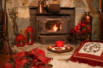 fireplace with candles and gifts