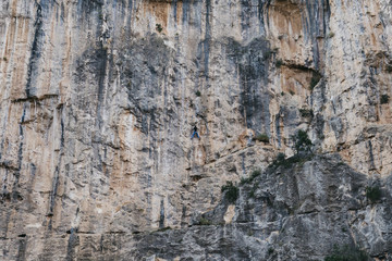 people rock climbing