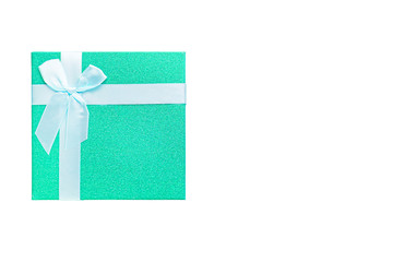 Green gift box with white ribbon isolated on white background.