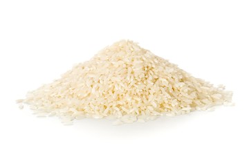Heap of white uncooked, raw long grain rice on white