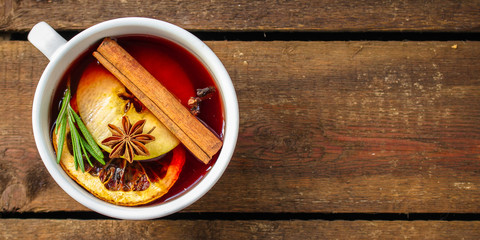 mulled wine, fragrant drink and festive mood atmosphere - concept New Year, Christmas. food background. copy space