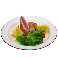 Tuna in sesame seeds with vegetables side dish without background