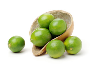 Fresh limes on white background