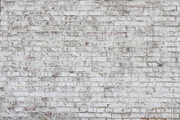 Old wall made of red brick, painted white in loft style for modern designer interior of room, bar or restaurant
