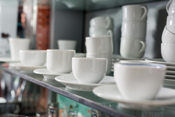 White ceramic cups in store