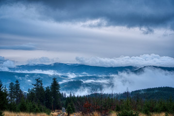 Beautiful view of clouds traveling over mountains in Beskydy, Czech