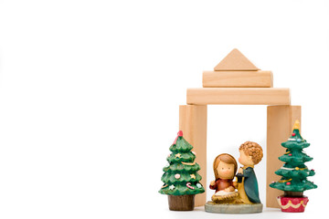 Christmas nativity scene of born child baby Jesus Christ in the manger with Joseph and Mary in...
