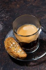 espresso and Italian cookies cantucci, vertical top view