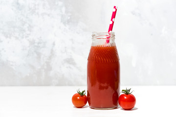 fresh tomato juice in a bottle, closeup