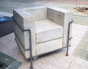 Armchair made of concrete blocks and fittings