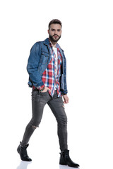 Fototapeta premium sexy fashion guy wearing plaid shirt and jeans jacket