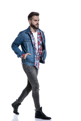 Fototapeta premium cool fashion model wearing plaid shirt and jeans jacket