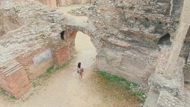 Aerial drone view of old Roman empire bath in Varna city, Bulgaria. Flying above public terms ruins of UNESCO world heritage. 