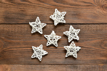 White decorative Christmas stars flat lay abstract background.