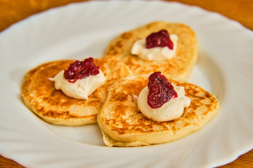 Pancakes on white plate