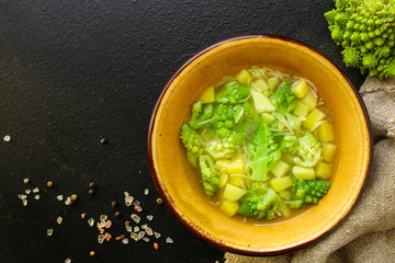 soup vegetables and cabbage romanesco cauliflower (delicious first course) menu concept. food background. top view. copy space