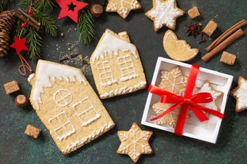 Christmas gingerbread cookies and ingredients for baking. Culinary background. Top view flat lay background.
