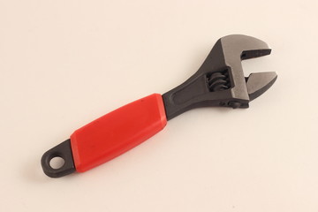 Close up new adjustable spanner tool on white background