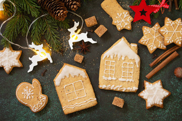 Christmas gingerbread cookies and ingredients for baking. Culinary background. Top view flat lay background.