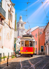 Famous vintage tram in the street of Alfama, Lisbon, Portugal