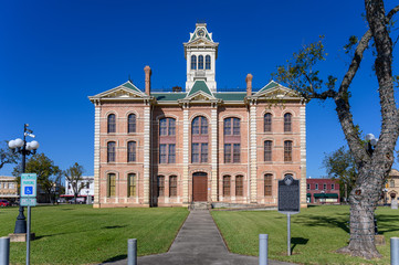 Fototapeta na wymiar Historic Wharton County Courthouse built in 1889 and Town Square in Wharton City in Wharton County in Southeastern Texas, United States