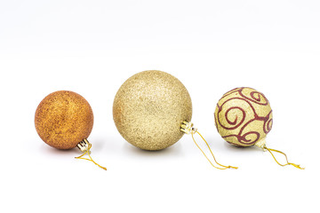 Christmas tree decorations. Golden Christmas balls on white background.