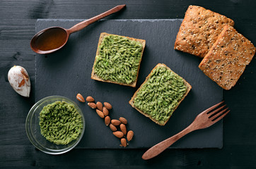 fresh avocado sandwiches on a stone Board, vegetarian snack, healthy food