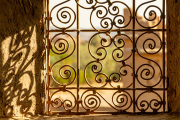 Fototapeta na wymiar Window with decorative lattice of the Kasbah Amridil, Ouled Yaacoub, Skoura.Morocco.