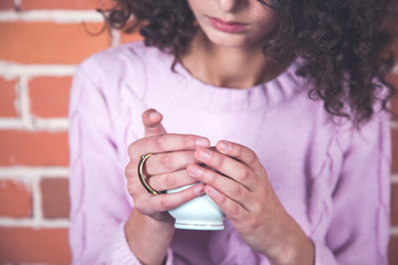 woman hand cup of tea