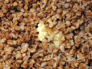 Buckwheat porridge, prepared from buckwheat groats favorite and useful product of Russian, Belarusian and Ukrainian cuisine. Healthy food, natural product, buckwheat porridge, close-up.