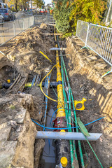 cables, pipes and sewage under pedestrian walkway